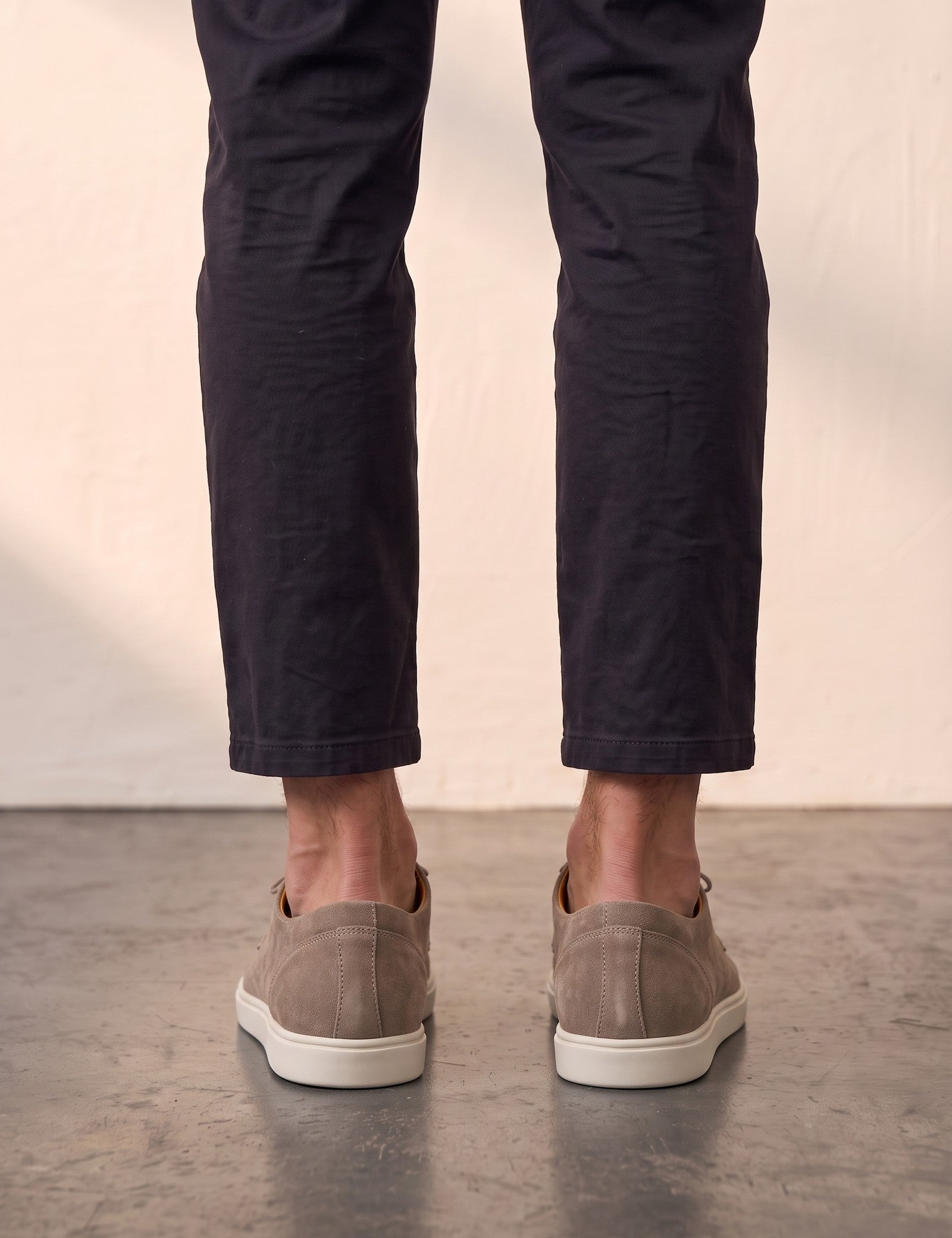 Men's Taupe Lace-Up Loafers with White Sole, back view of the heels, worn.