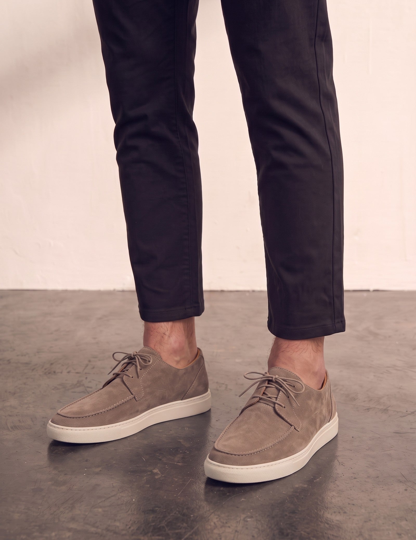 Men's Taupe Lace-Up Loafers with White Sole, three-quarter front view of the shoes, worn.