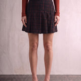 Women's Black and Red Tartan High Waisted Pleated Mini Skirt, front view from the waist down.