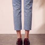 Women's Burgundy Patent Block Heel Loafers, back view of the heels, worn.