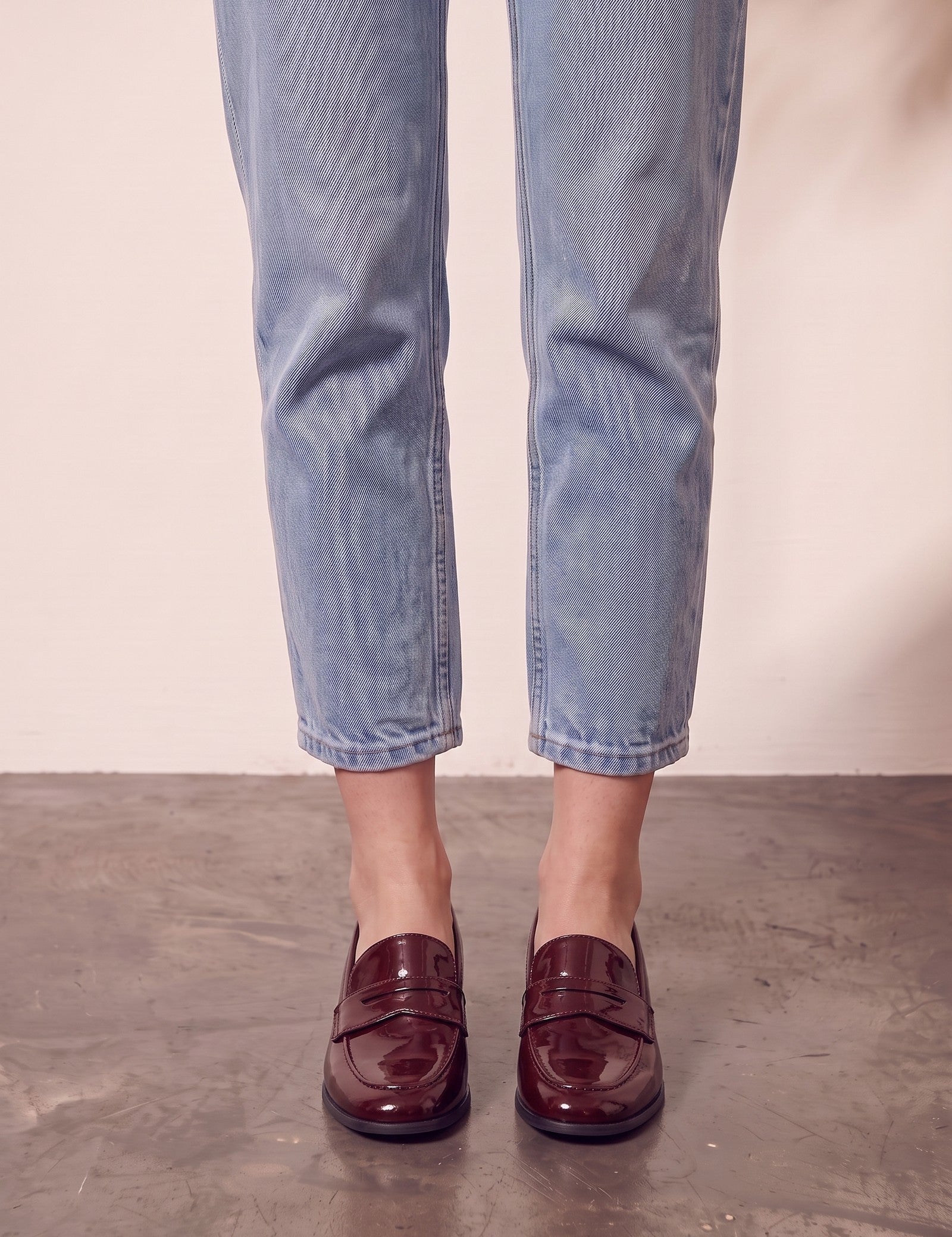 Women's Burgundy Patent Block Heel Loafers, front view of the shoes, worn.