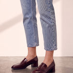 Women's Burgundy Patent Block Heel Loafers, side view of the shoe, worn.