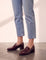 Women's Burgundy Patent Block Heel Loafers, side view of the shoe, worn.