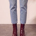 Women's Burgundy Patent Pointed Block Heel Ankle Boots, front view of the shoes, worn.
