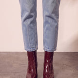 Women's Burgundy Patent Pointed Block Heel Ankle Boots, front view of the shoes, worn.