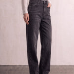 Women's Washed Black High Waisted Wide Leg Jeans, three-quarter view from the waist down.
