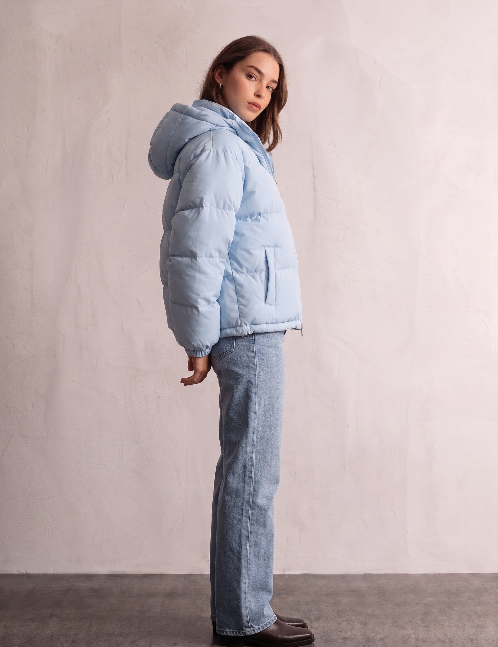 Women's Baby Blue Hooded Puffer Jacket with Pockets, side view, full length.