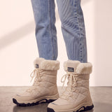 Women's Beige Faux Fur Lined Lace-Up Winter Boots, side view of the shoe, worn.