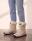 Women's Beige Faux Fur Lined Lace-Up Winter Boots, side view of the shoe, worn.
