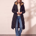 Women's Black Longline Quilted Winter Coat with Hood, front view, full length.