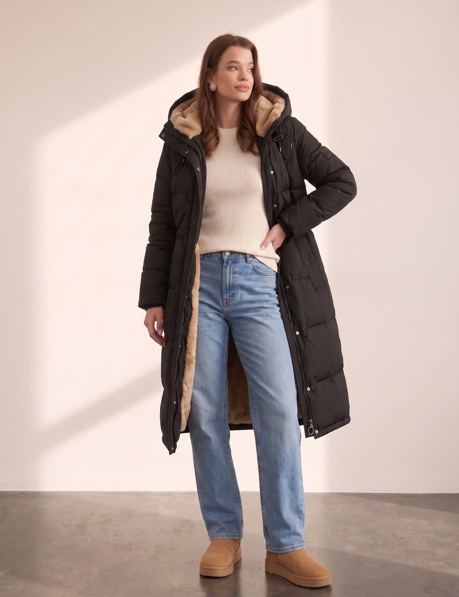 Women's Black Longline Quilted Winter Coat with Hood, side view, full length.