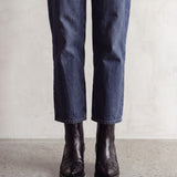 Women's Black Western Ankle Boots with Pointed Toe, front view of the shoes, worn.