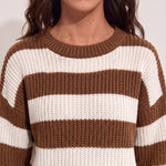 Women's Brown and White Striped Chunky Knit Jumper, close-up of the upper body.