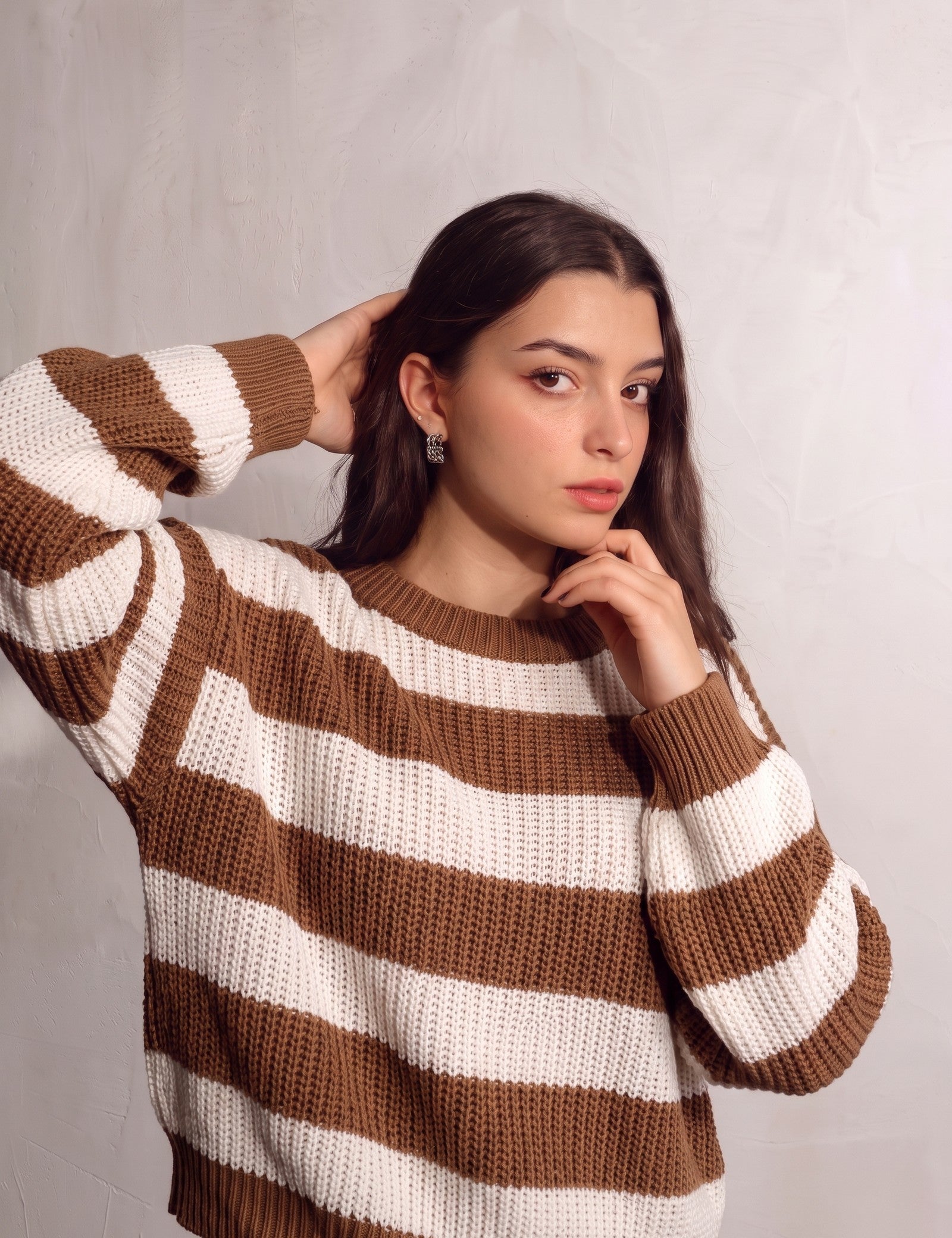Women's Brown and White Striped Chunky Knit Jumper, close-up of the upper body.