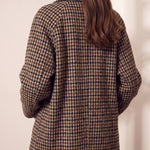 Women's Brown Oversized Houndstooth Blazer Coat, close-up of the upper body.