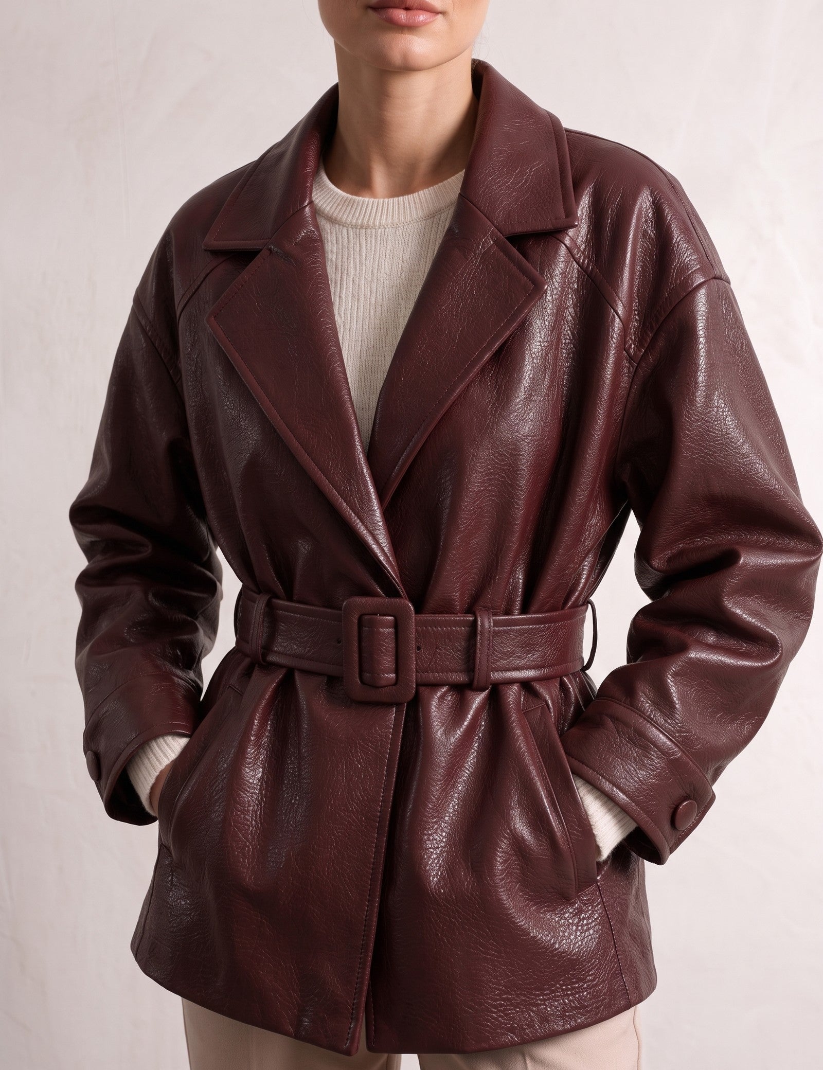 Women's Burgundy Belted Leather-Look Jacket with Lapels, close-up of the upper body.