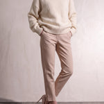 Women's Cream Relaxed Fit Roll Neck Jumper, close-up of the upper body.
