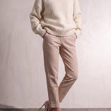 Women's Cream Relaxed Fit Roll Neck Jumper, close-up of the upper body.