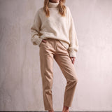 Women's Cream Relaxed Fit Roll Neck Jumper, front view, full length.