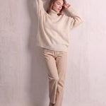 Women's Cream Relaxed Fit Roll Neck Jumper, front view, full length.