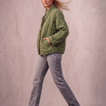 Women's Green Relaxed Fit Quilted Jacket with Pockets, side view, full length.