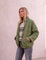 Women's Green Relaxed Fit Quilted Jacket with Pockets, three-quarter view from the right, full length.