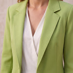Women's Green Tailored Single-Breasted Blazer, close-up of the upper body.