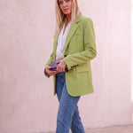 Women's Green Tailored Single-Breasted Blazer, three-quarter view from the right, full length.