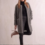 Women's Grey Longline Teddy Coat with Patch Pockets, three-quarter view from the left, full length.
