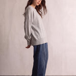 Women's Grey Oversized Crew Neck Jumper, side view, full length.