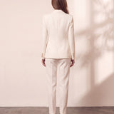 Women's Ivory Double-Breasted Blazer with Gold Buttons, close-up of the upper body.