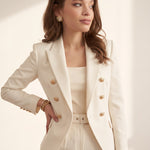 Women's Ivory Double-Breasted Blazer with Gold Buttons, three-quarter view from the right, full length.