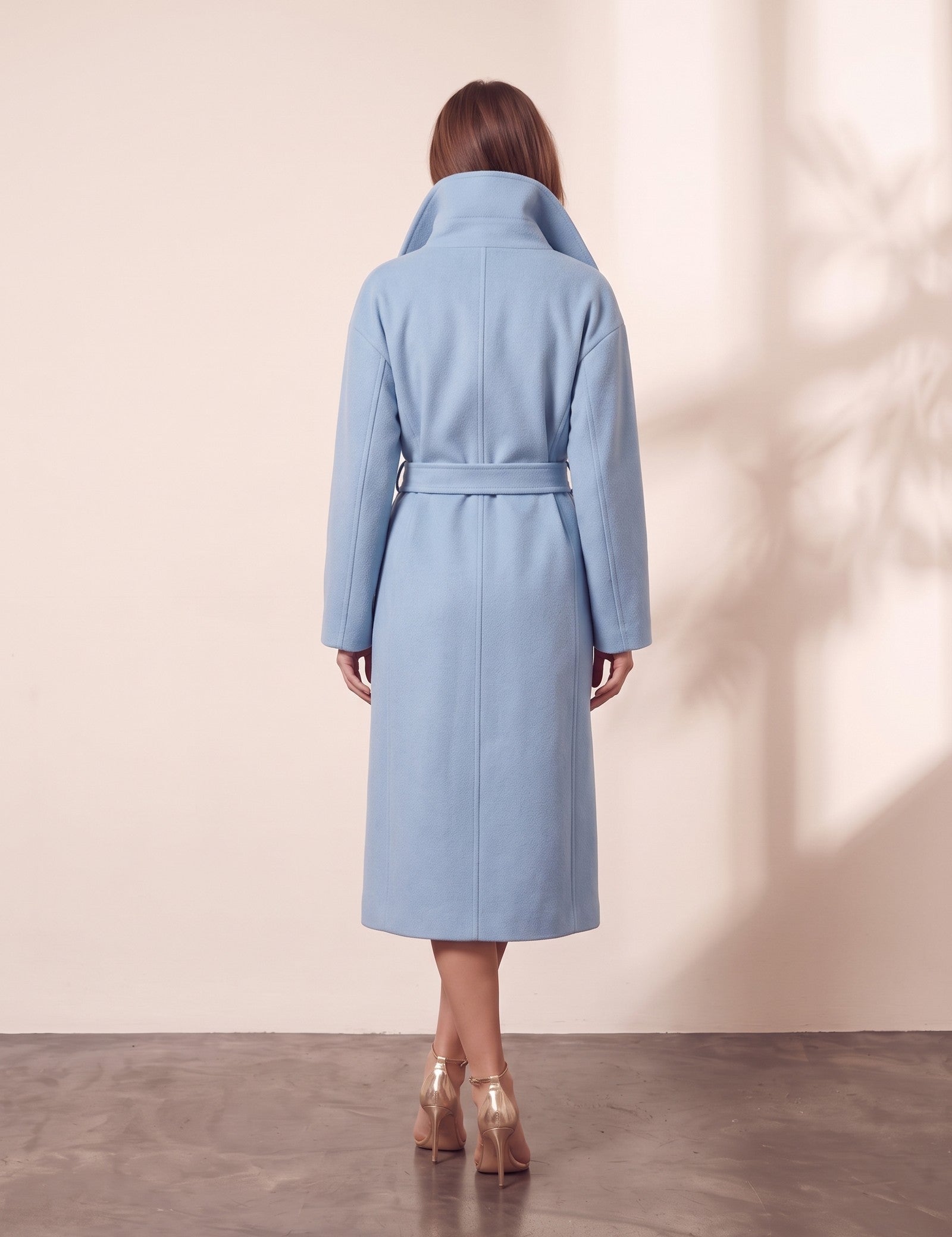 Women's Light Blue Belted Longline Coat, close-up of the upper body