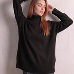 Women's Relaxed Fit Roll Neck Jumper in Black, front view, full length.