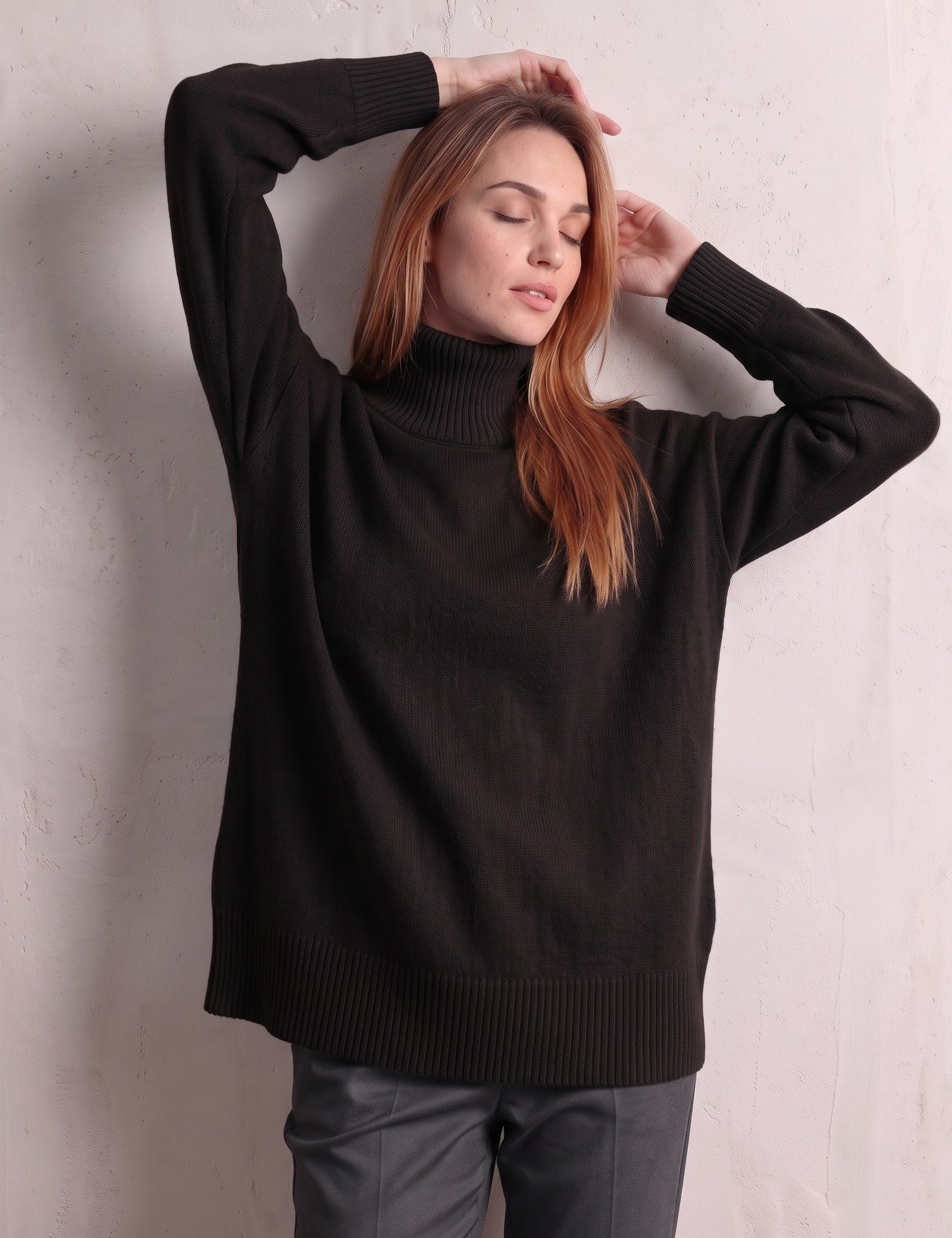 Women's Relaxed Fit Roll Neck Jumper in Black, front view, full length.