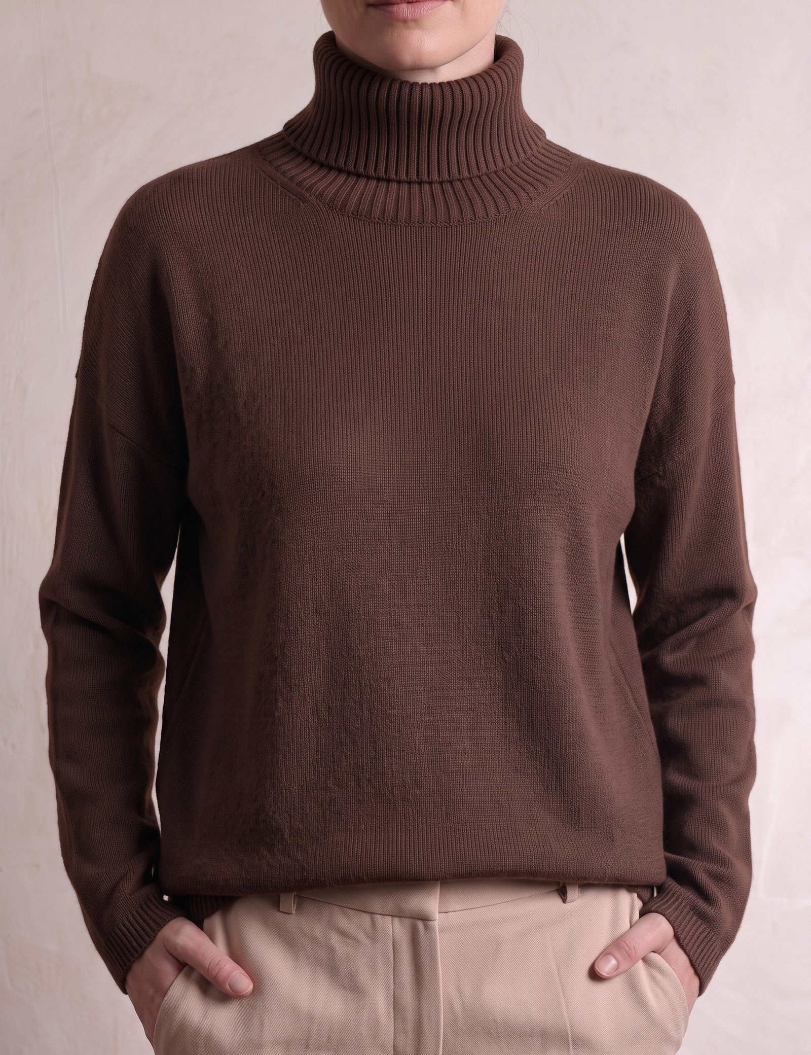 Women's Relaxed Fit Roll Neck Jumper in Brown, close-up of the upper body.