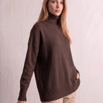 Women's Relaxed Fit Roll Neck Jumper in Brown, three-quarter view from the left, full length.