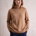 Women's Relaxed Fit Roll Neck Jumper in Camel, front view, full length.