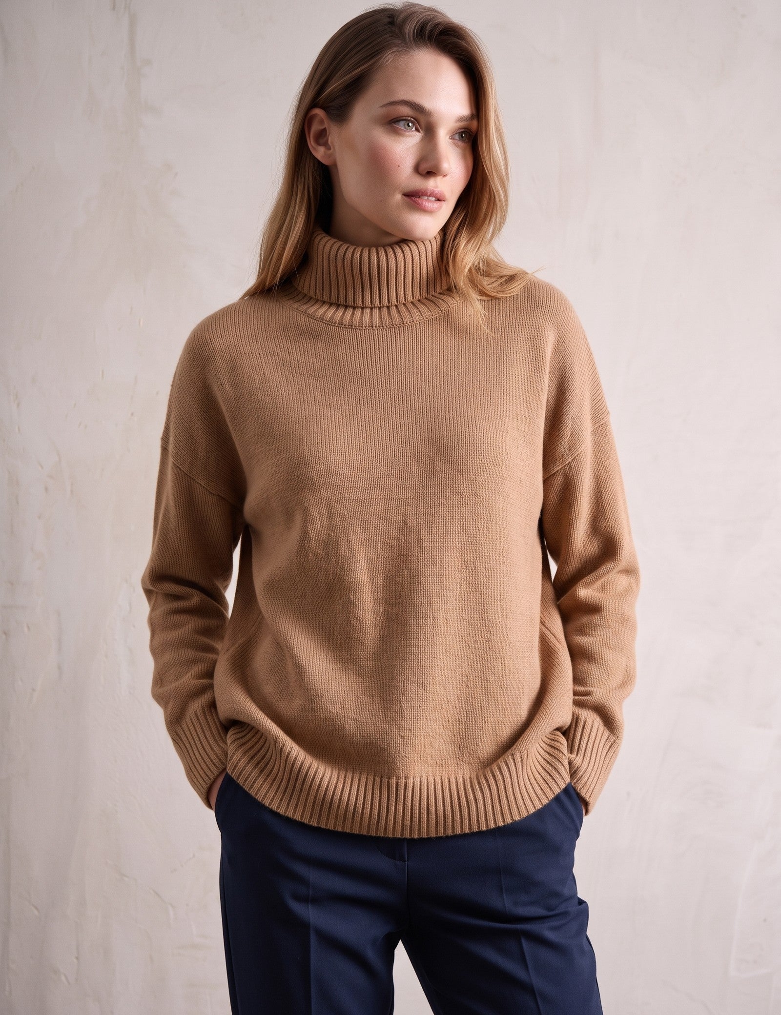 Women's Relaxed Fit Roll Neck Jumper in Camel, front view, full length.