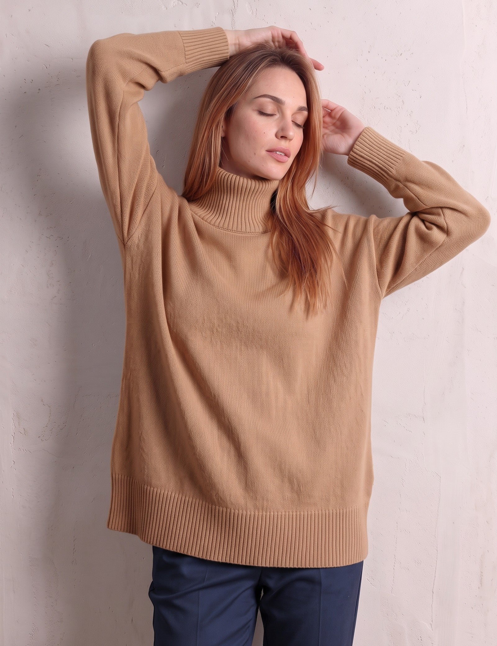Women's Relaxed Fit Roll Neck Jumper in Camel, front view, full length.