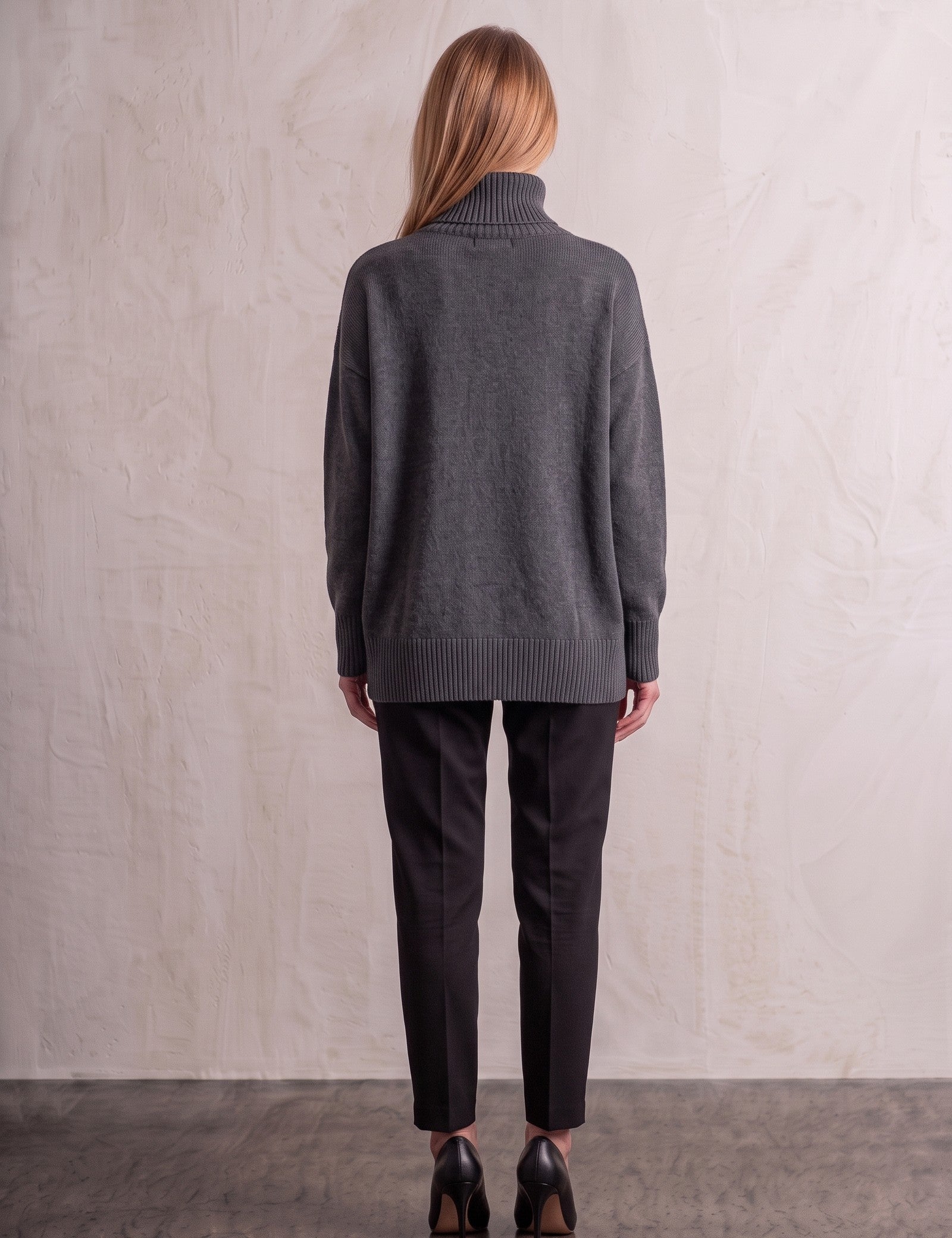 Women's Relaxed Fit Roll Neck Jumper in Dark Grey, back view, full length.