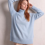 Women's Relaxed Fit Roll Neck Jumper in Light Blue, front view, full length.