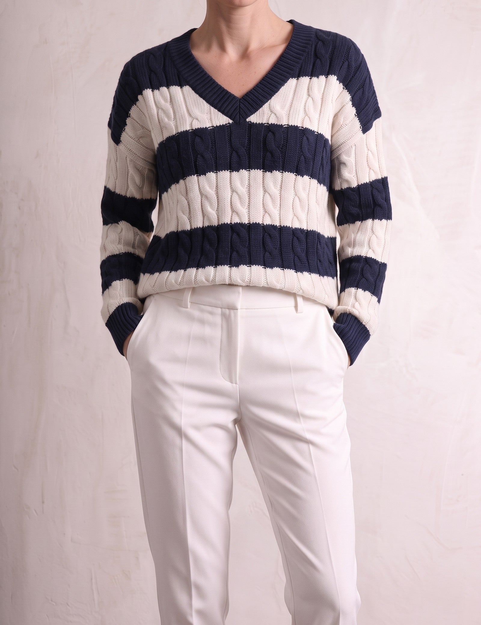 Women's Navy and Cream Striped Cable Knit V-Neck Jumper, close-up of the upper body.