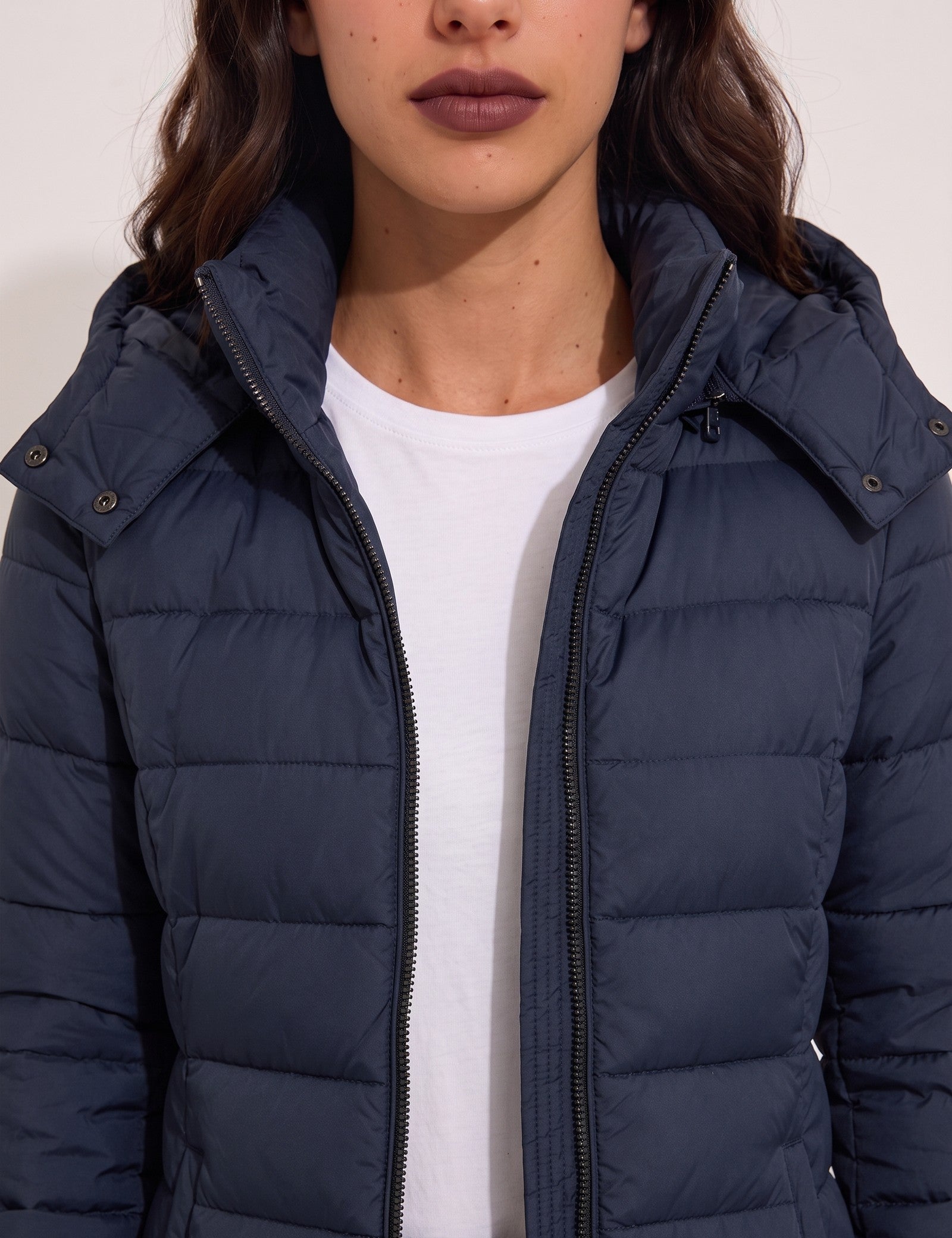 Women's Navy Longline Hooded Quilted Puffer Jacket, close-up of the upper body.