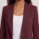 Women's Tailored Two-Piece Trouser Suit, close-up of the upper body