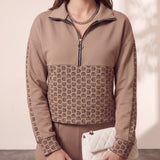 Women's Taupe Quarter-Zip Tracksuit with Tapered Joggers, close-up of the upper body