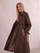 Deluxe Trench Coat, three-quarter view from the right, full length.