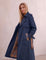 Deluxe Trench Coat, three-quarter view from the right, full length.